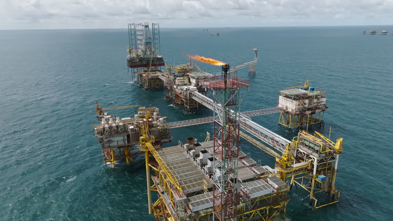 Wide aerial shot of huge offshore processing platform near South Vietnam, oil and gas industry