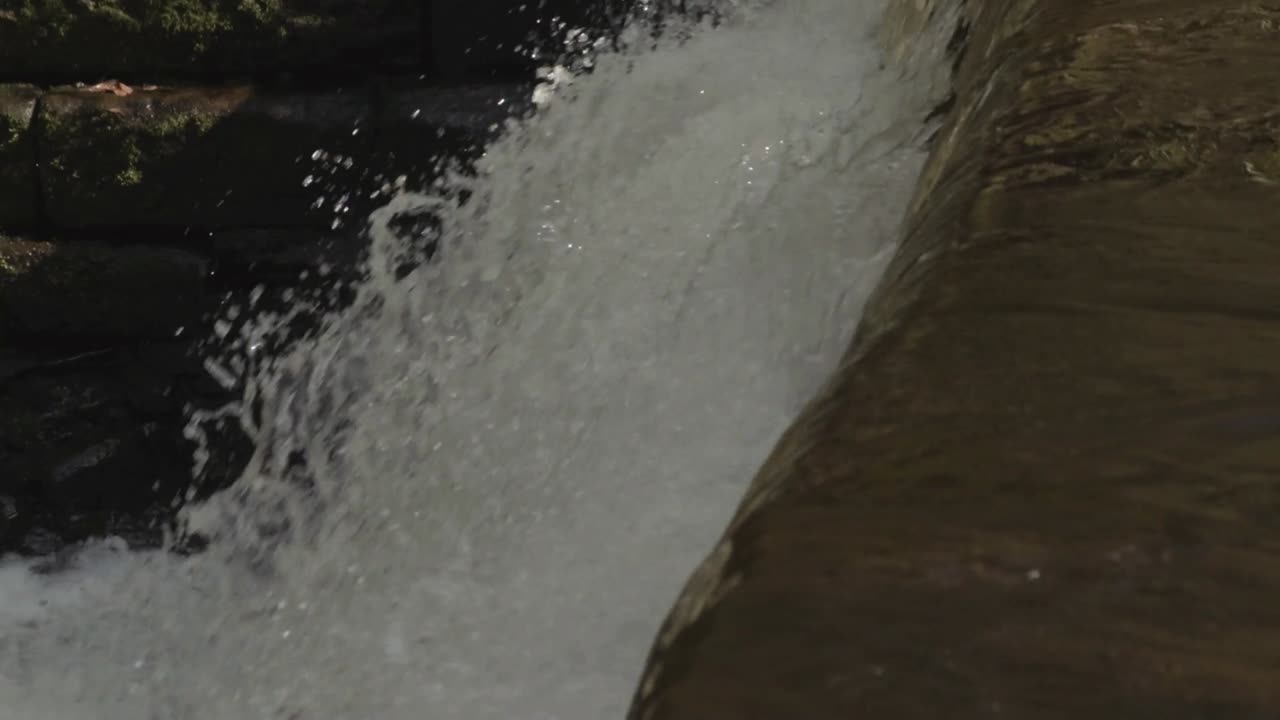 Weir gushing white water