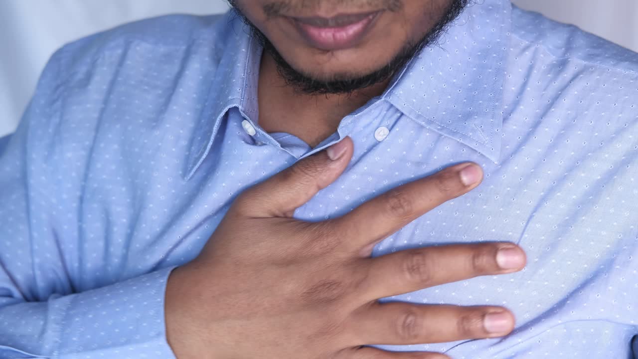 Man Experiencing Chest Pain