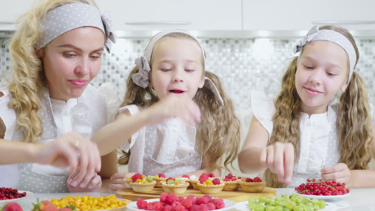 Happy Family Making Fruit Tarts