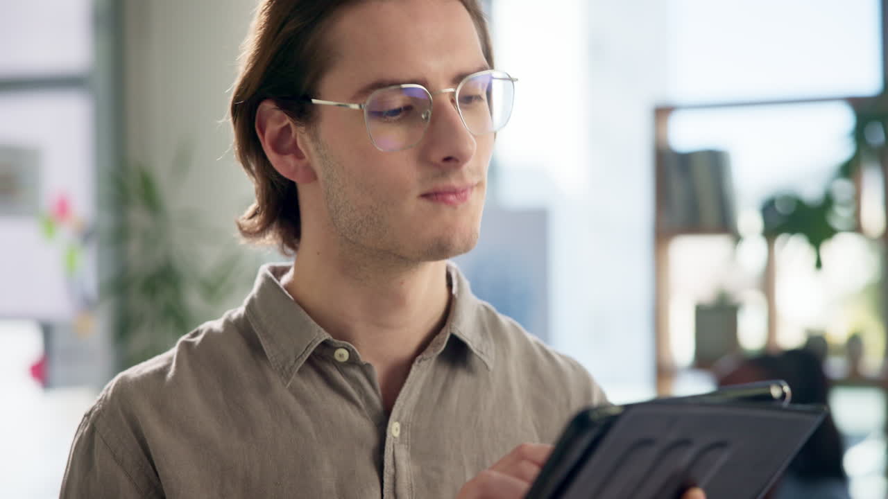 Man with glasses in office