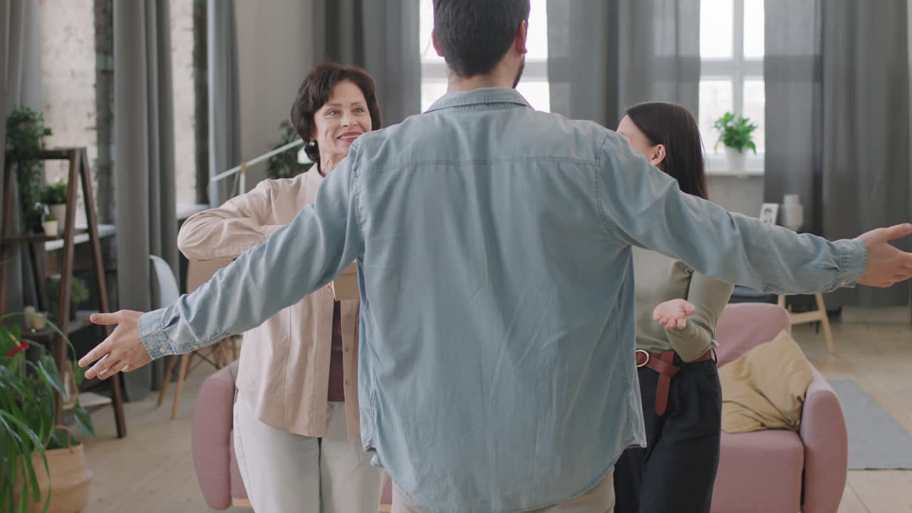 Family greeting with a hug