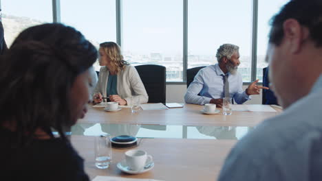 corporate business people meeting in boardroom brainstorming colleagues discussing strategy sharing problem solving ideas collaborating in office 4k