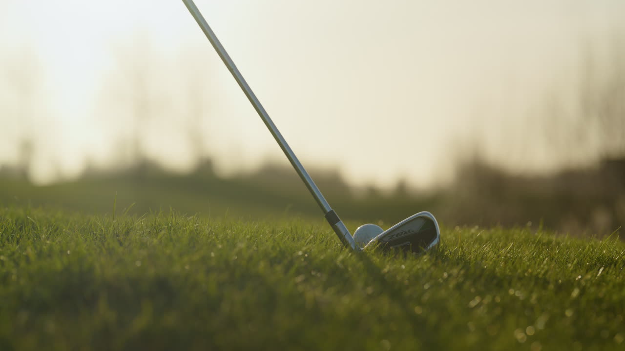 Placing Golf Club Behind Ball, Low Angle Close Up at Golden Hour SLOMO