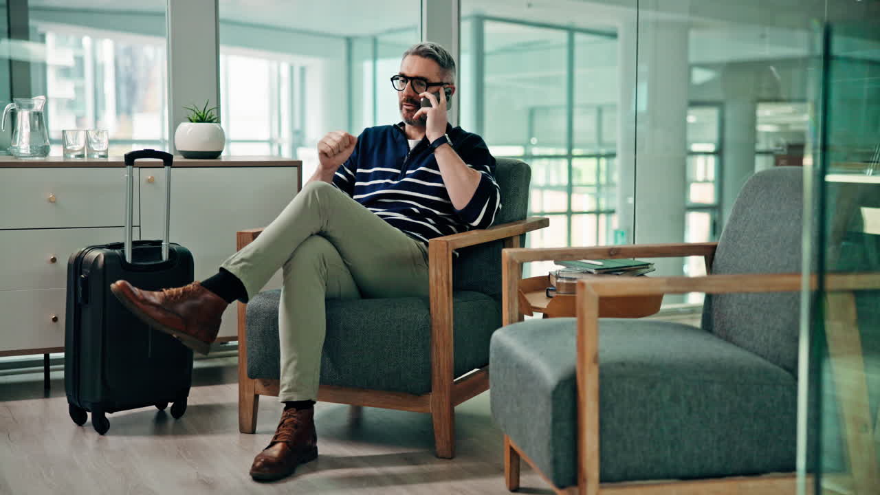 Man on phone call in office waiting area