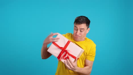 man excited about receiving a gift