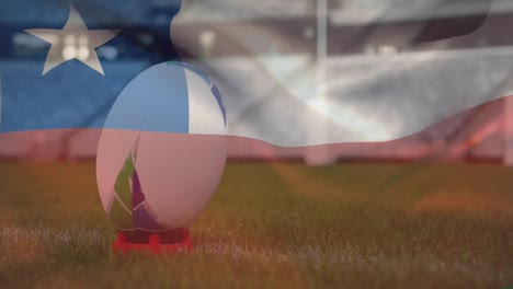 Animation-Einer-Chilenischen-Flagge,-Die-über-Einem-Auf-Einem-Spielfeld-Liegenden-Rugbyball-Weht,-Digitale-Komposition