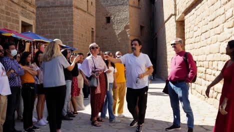 tourists explore a historic marketplace