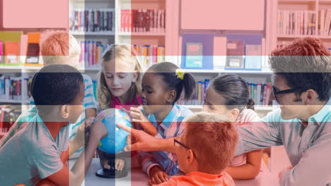 animation of flag of greece over happy male teacher and children in school classroom