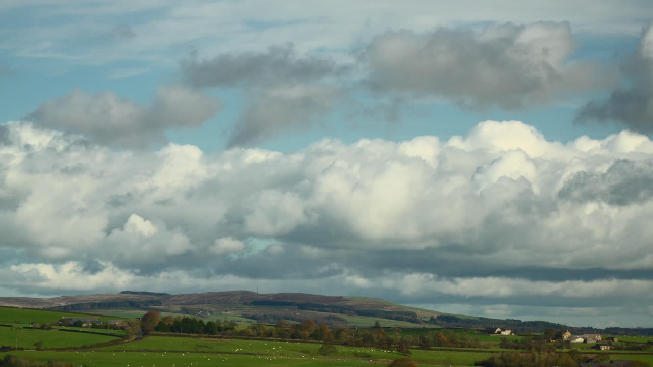Cumulonimbus And Nimbus Clouds Forming Over Lush English Countryside. Time Lapse 60x Normal Speed