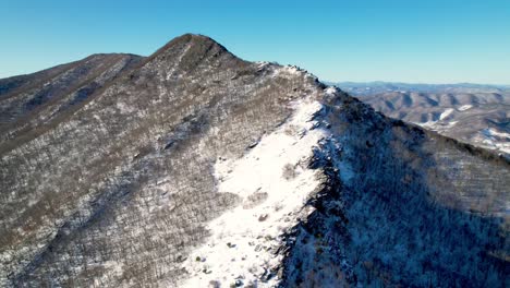 aerial pullout to wide shot of snake mountain nc, north carolina near boone nc