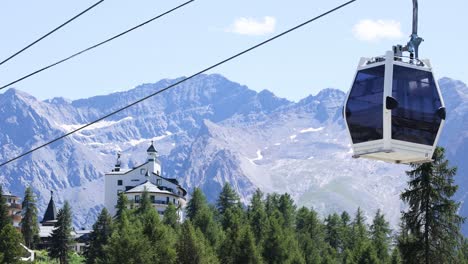 cable car moving over forested mountain landscape