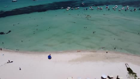 An-aerial-shot-of-boats-moored-near-the-island-shore