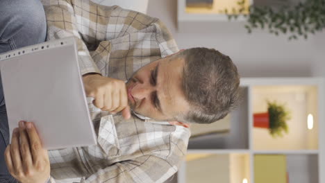 Vertical-video-of-The-man-who-frets-over-abusive-paperwork.