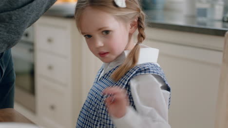 beautiful little girl eating breakfast getting ready father taking daughter to school enjoying caring for childs future