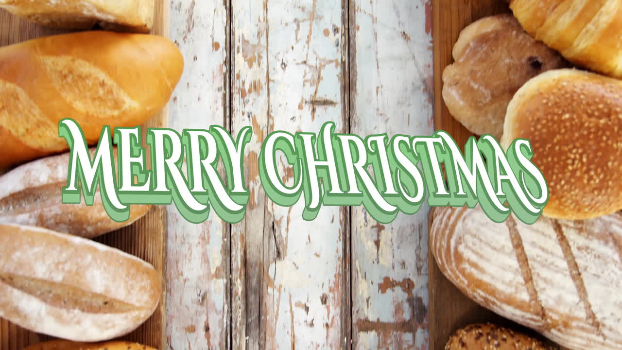 Surrounding Merry Christmas text, assorted breads on rustic wooden background