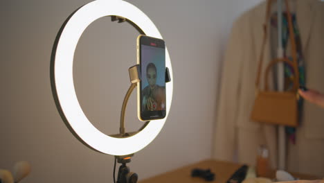 cellphone view woman blogging house. closeup beauty blogger creating visage blog