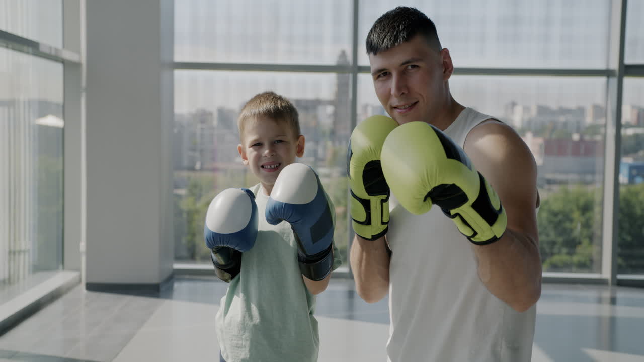 Father and son boxing practice