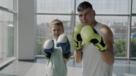 father and son boxing practice