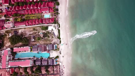 aerial view of a tropical resort on a beautiful beach