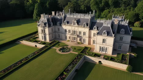 grand luxury mansion with manicured gardens and fountain
