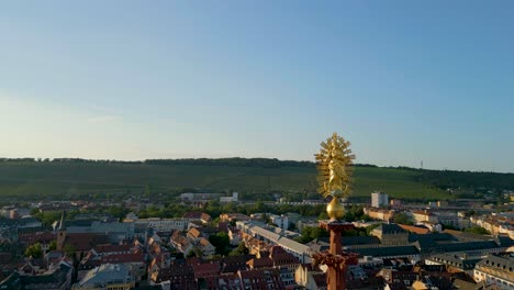 4k aerial drone video of the ornate steeple of st mary's chapel in downtown würzburg, germany