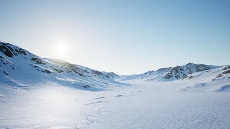 Aerial-Landscape-of-snowy-mountains-and-icy-shores-in-Antarctica