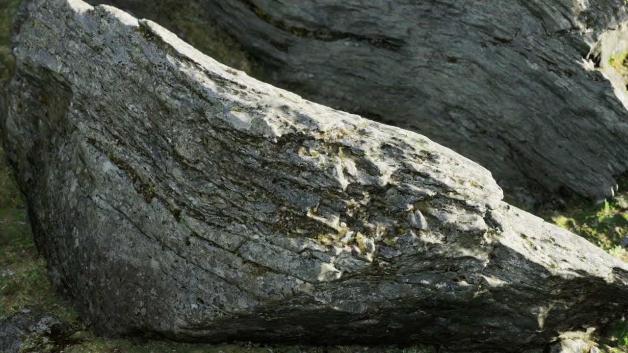 Natural rock formations create stunning patterns in a serene landscape