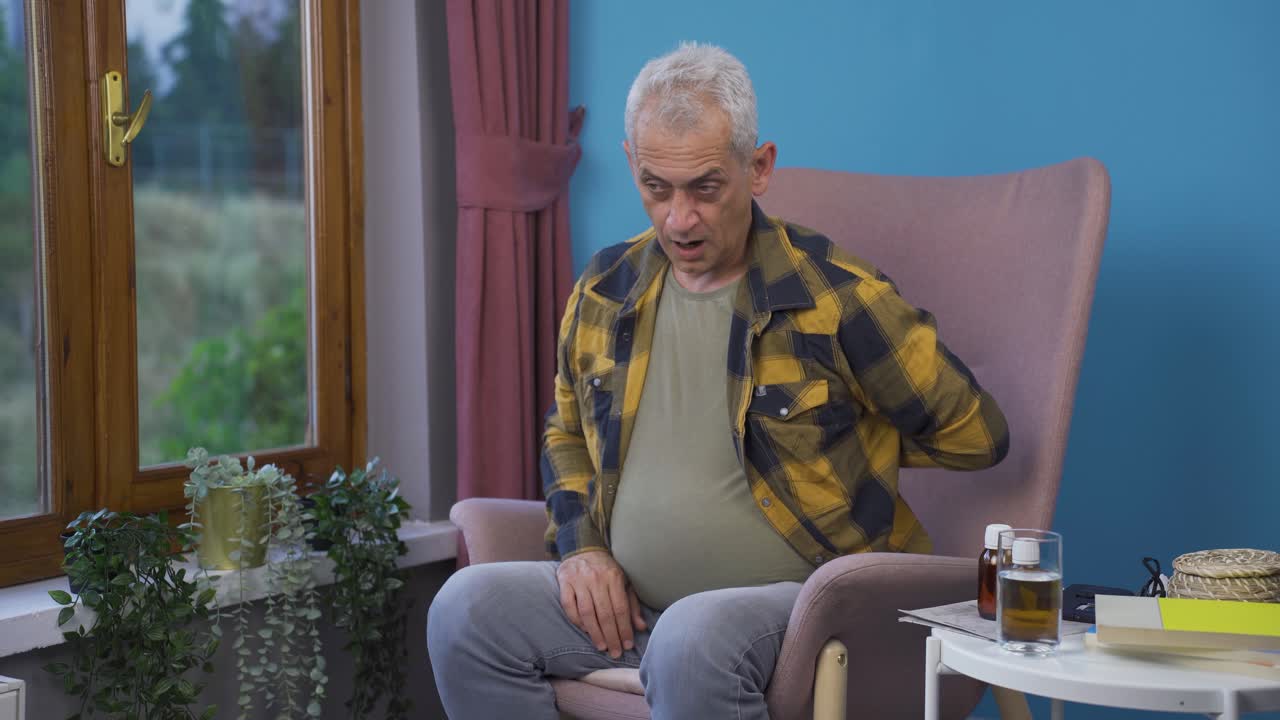 Sick man with back pains.