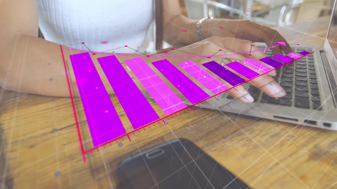 animación de gráficos sobre patrón de cuadrícula sobre vista de ángulo bajo de una mujer biracial trabajando en una computadora portátil