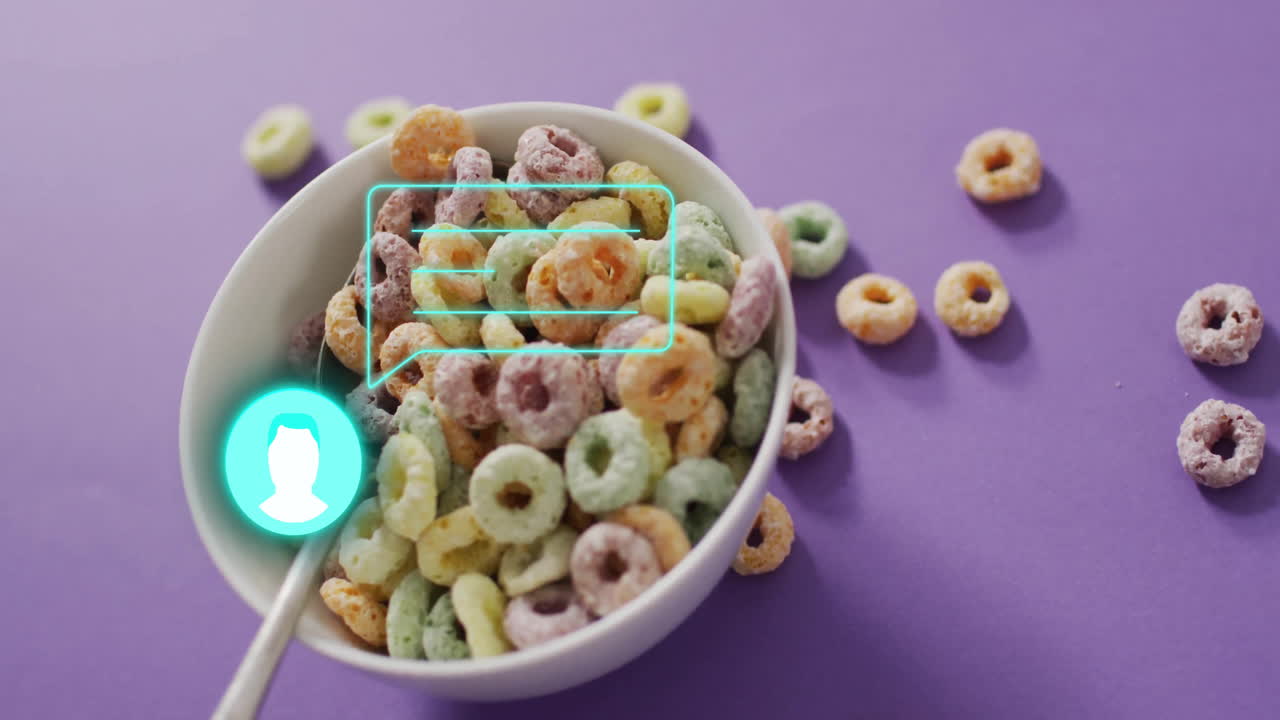 Bowl of colorful cereal with chat bubble animation on purple background