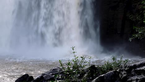 A-closeup-of-Whangarei-Falls-raging-after-a-lot-of-rain-throughout-Northland,-New-Zealand-Aotearoa