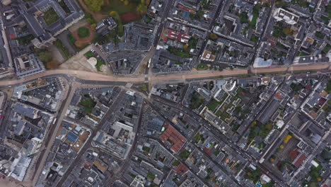 aerial vertical top view over le mans city center residential houses tramway