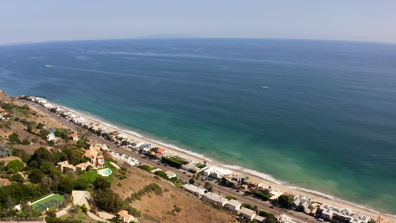 Drone footage of the PCH California as cars drive