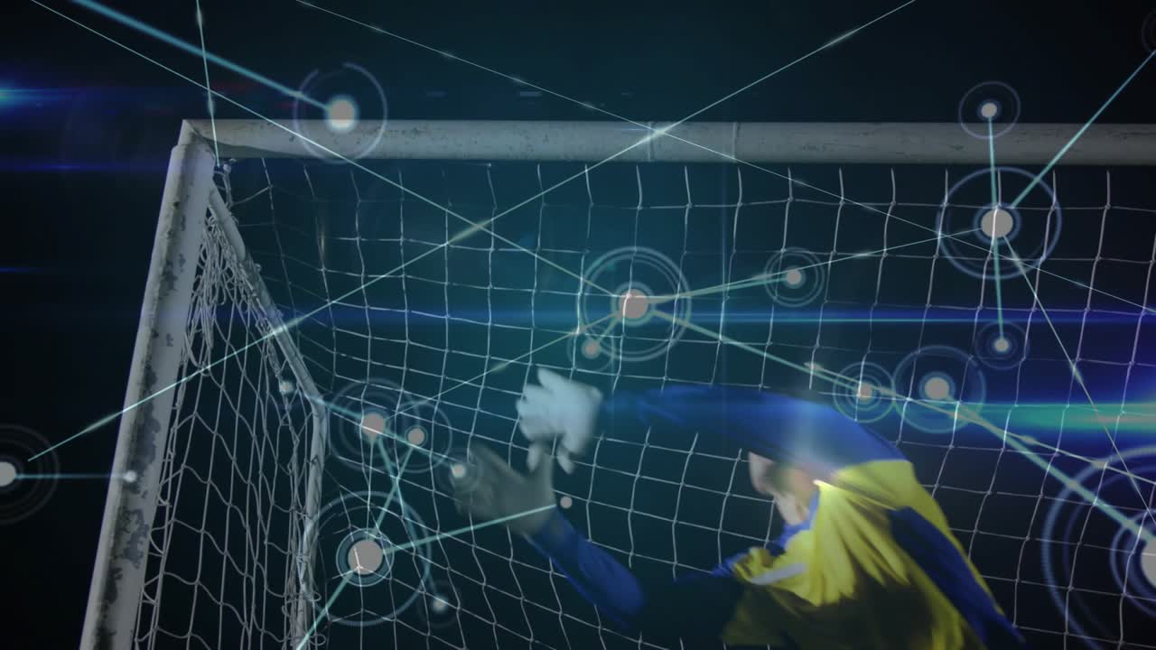 Goalkeeper tracking incoming ball, timing leap saving while HUD nodes mapping net for sports tech
