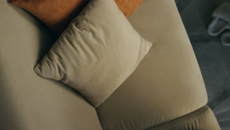 Carefree-girl-talking-phone-call-apartment-closeup.-Smiling-woman-laying-couch