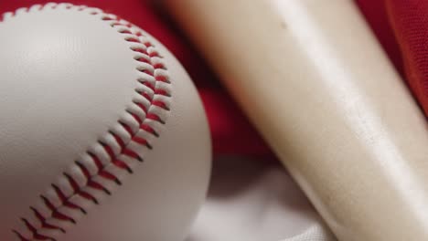 close up baseball still life with bat and ball on american flag 3