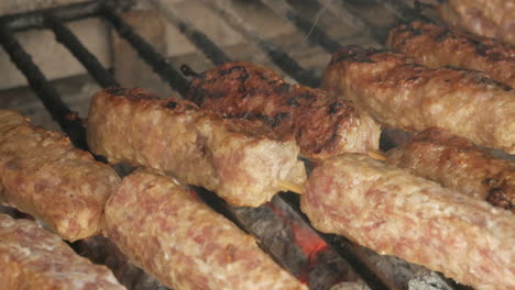 close up shot, beautiful romanian meat kebat cooking at grill