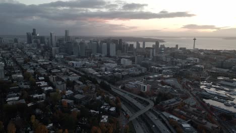 aerial establishing shot of the seattle skyline under moody lighting