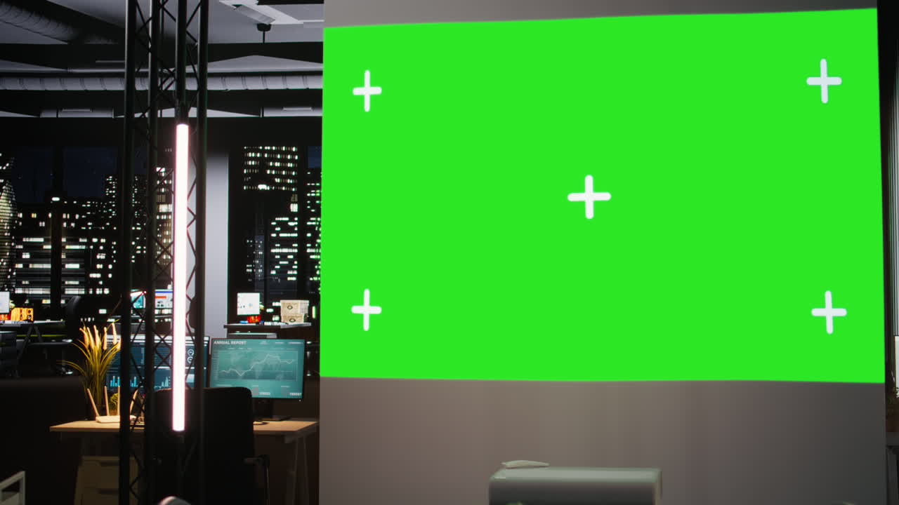 Empty boardroom with a digital copy space projection for a late night session