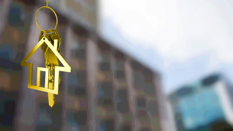 animation of gold house key fob and key, hanging in front of blurred city building