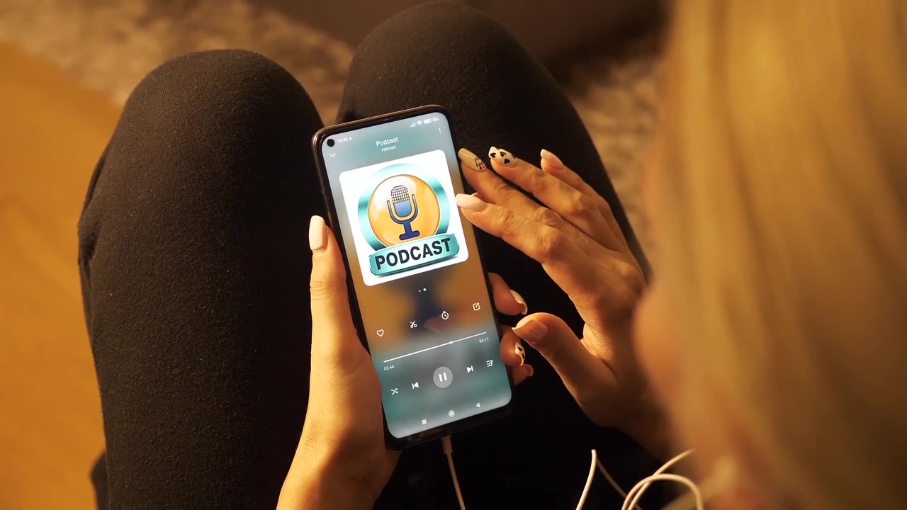 Woman Listening to Podcast on Smartphone