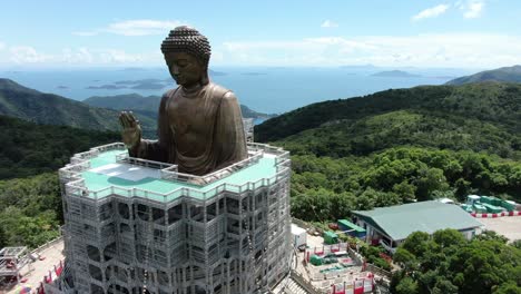 hong kong nong ping big buddha and surrounding lush green environment, aerial view