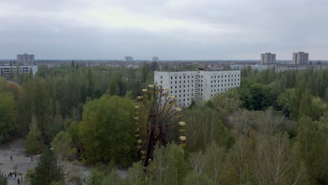 old rusty ferris wheel in the abandoned amusement park in pripyat, ukraine - chernobyl exclusion zone - aerial drone