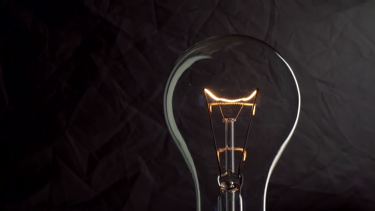 Light bulb on dark background