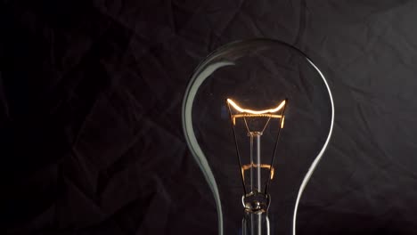 light bulb on dark background