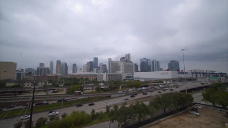 wide angle drone view of downtown houston and 59 freeway