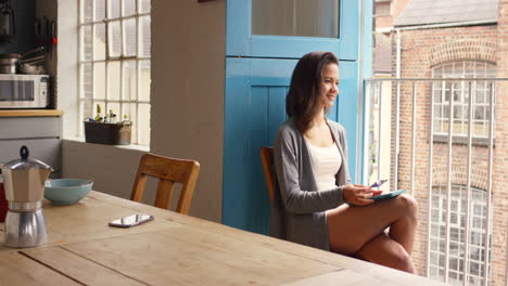 Young-caucasian-woman-happy-smiling-sitting-chair