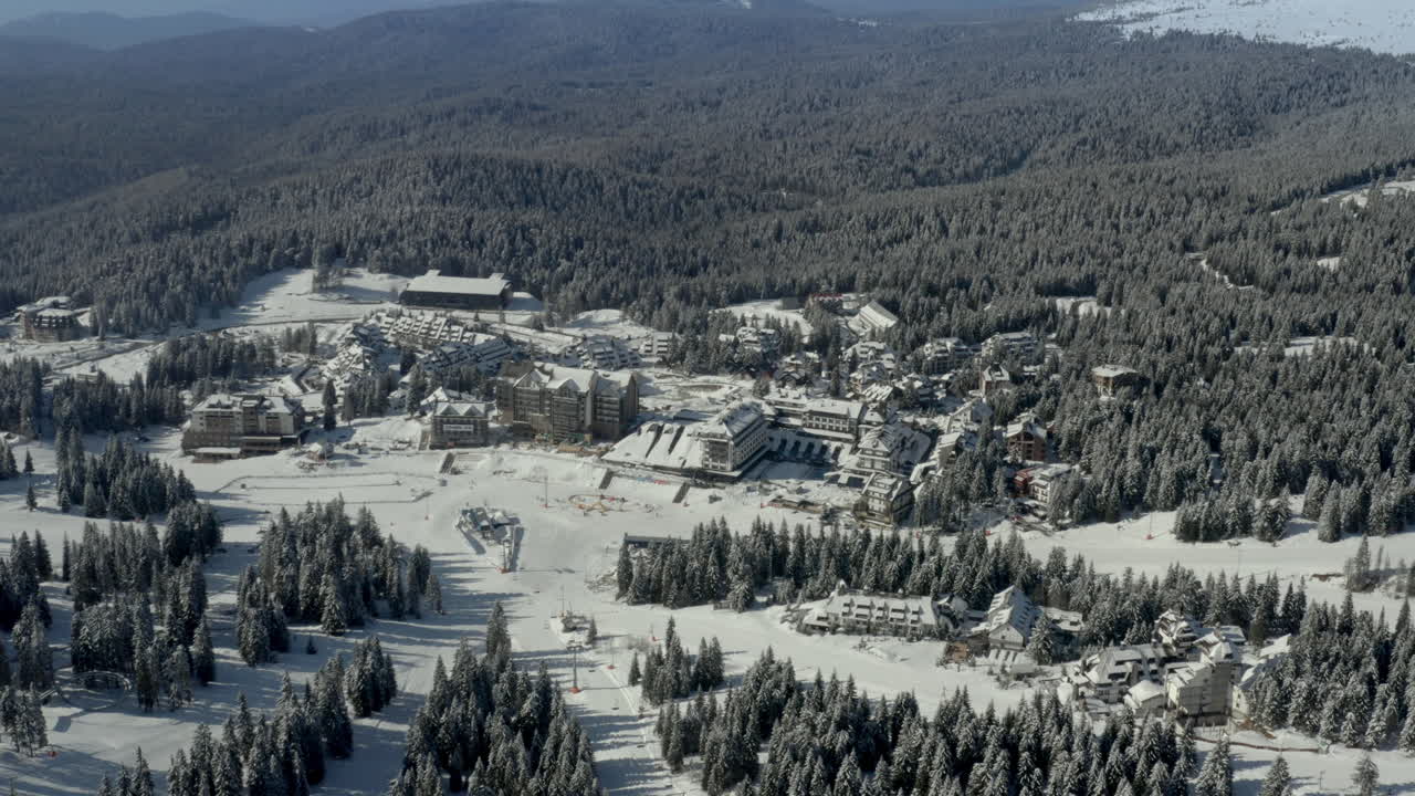 Aerial View of a Snowy Mountain Ski Resort in Winter