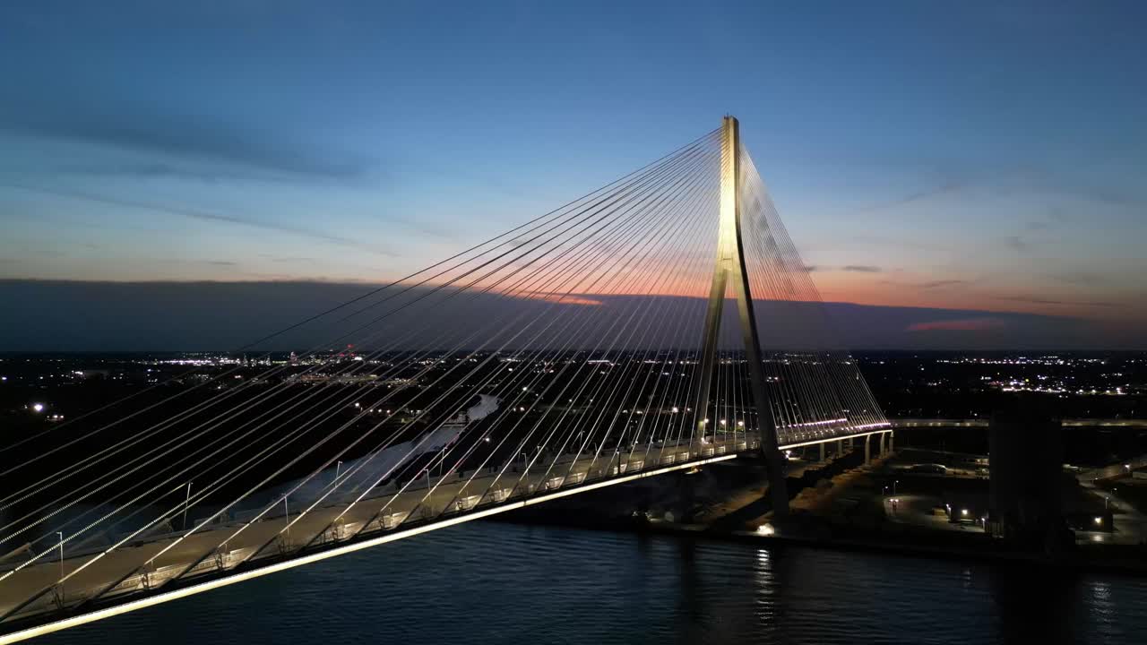 Night shot of Gordie Howe Bridge. Featuring sunset